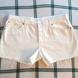 90's inspired boyfriend Denim shorts. Low/mid waist, button fly, raw-edge hems.